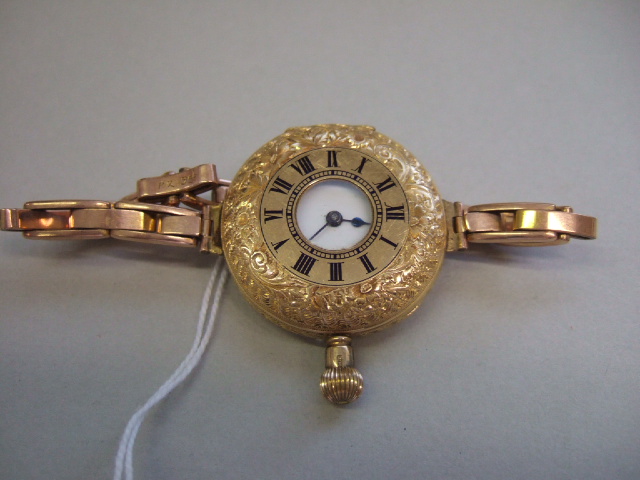 Appraisal: A ladies ct gold cased keyless wind half hunting cased