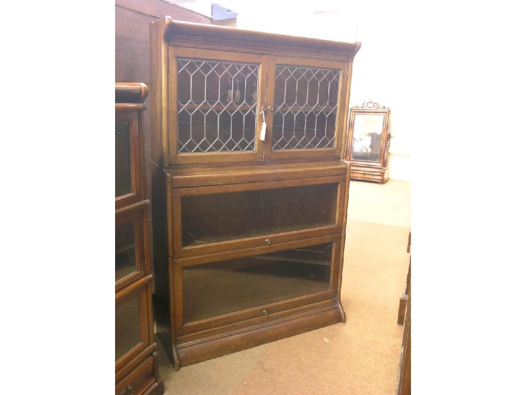 Appraisal: A Globe Wernicke-type mahogany bookcase three sections uppermost section with