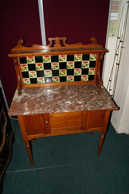 Appraisal: TWO VICTORIAN MARBLE TOP WALNUT WASH STANDS each with Edwardian