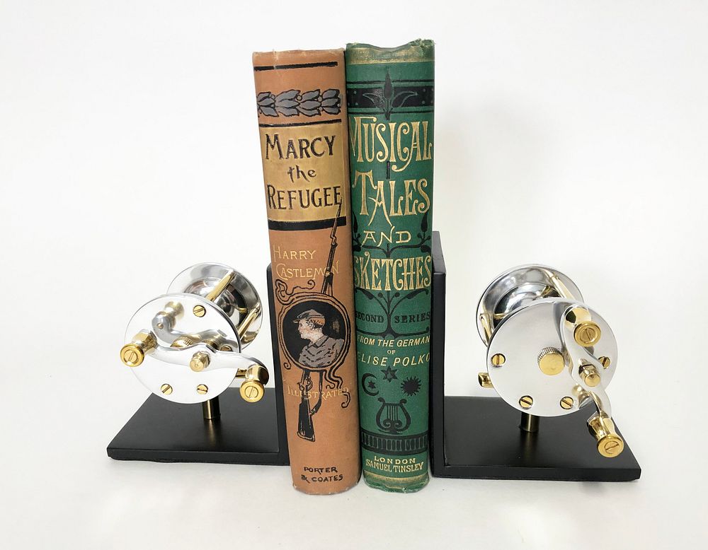 Appraisal: Pair of Polished Chrome and Brass Fishing Reel Bookends Pair