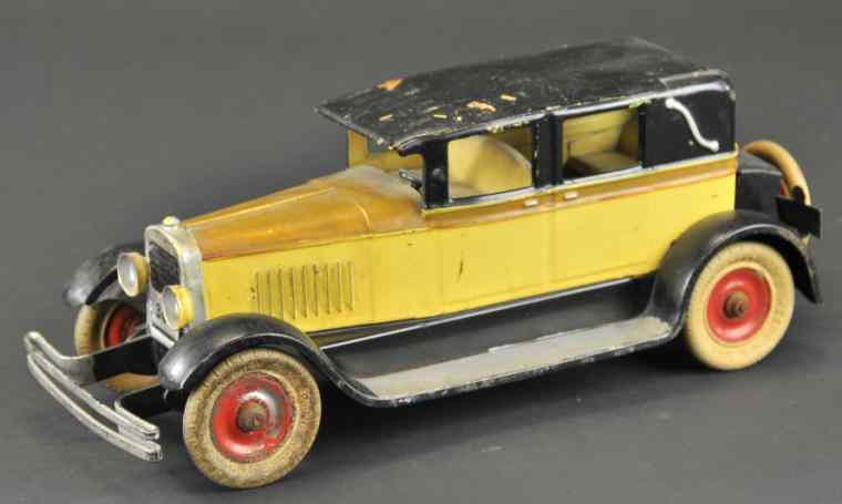 Appraisal: KINGSBURY SEDAN c pressed steel painted in brown and yellow