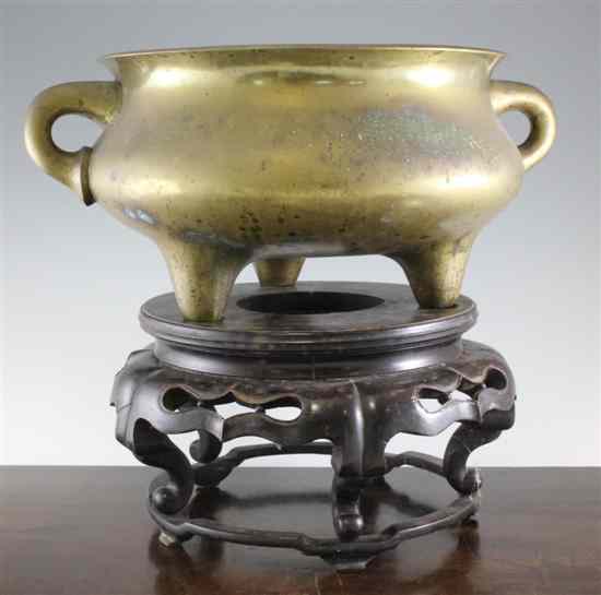 Appraisal: A large Chinese bronze tripod censer Qianlong seal mark but