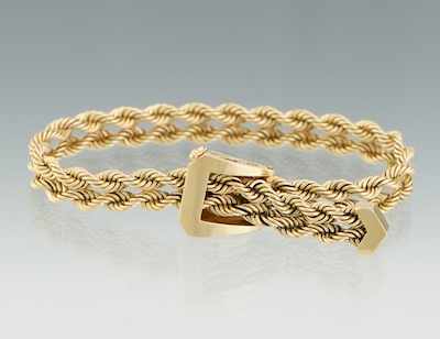 Appraisal: A Ladies' Buckle Design Bracelet k yellow gold twist rope