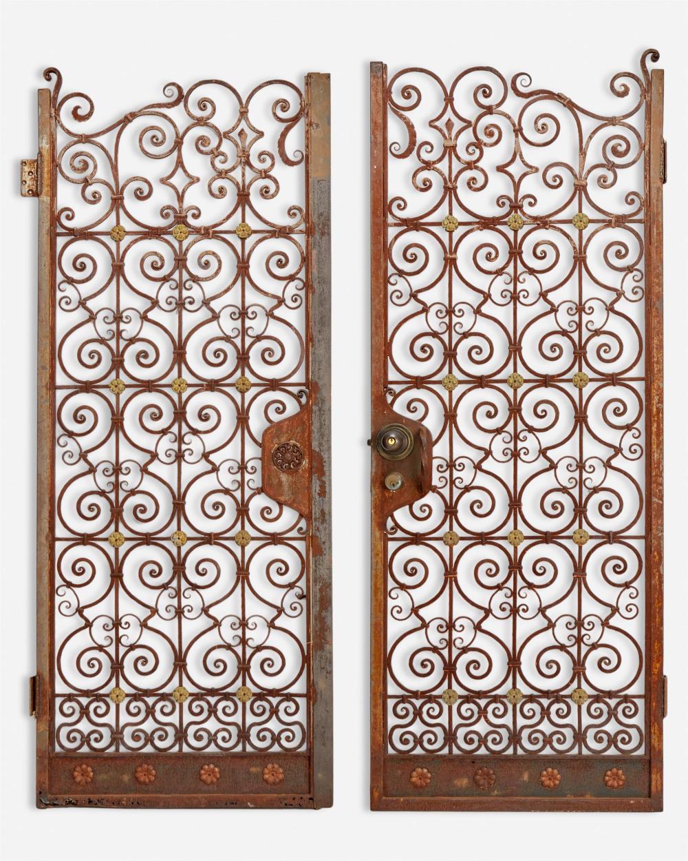 Appraisal: A pair of wrought iron garden gates First-quarter th Century