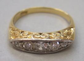 Appraisal: A gold and diamond set five stone ring mounted with