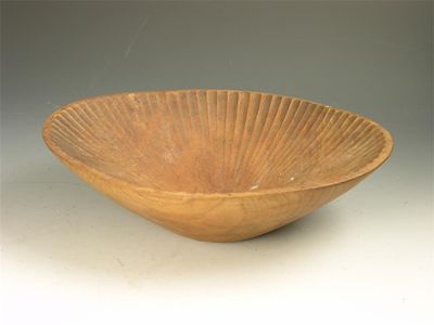 Appraisal: An oval sycamore bowl by David Pye with a fluted