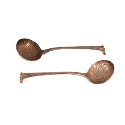 Appraisal: A pair of Onslow pattern silver sauce ladles London with