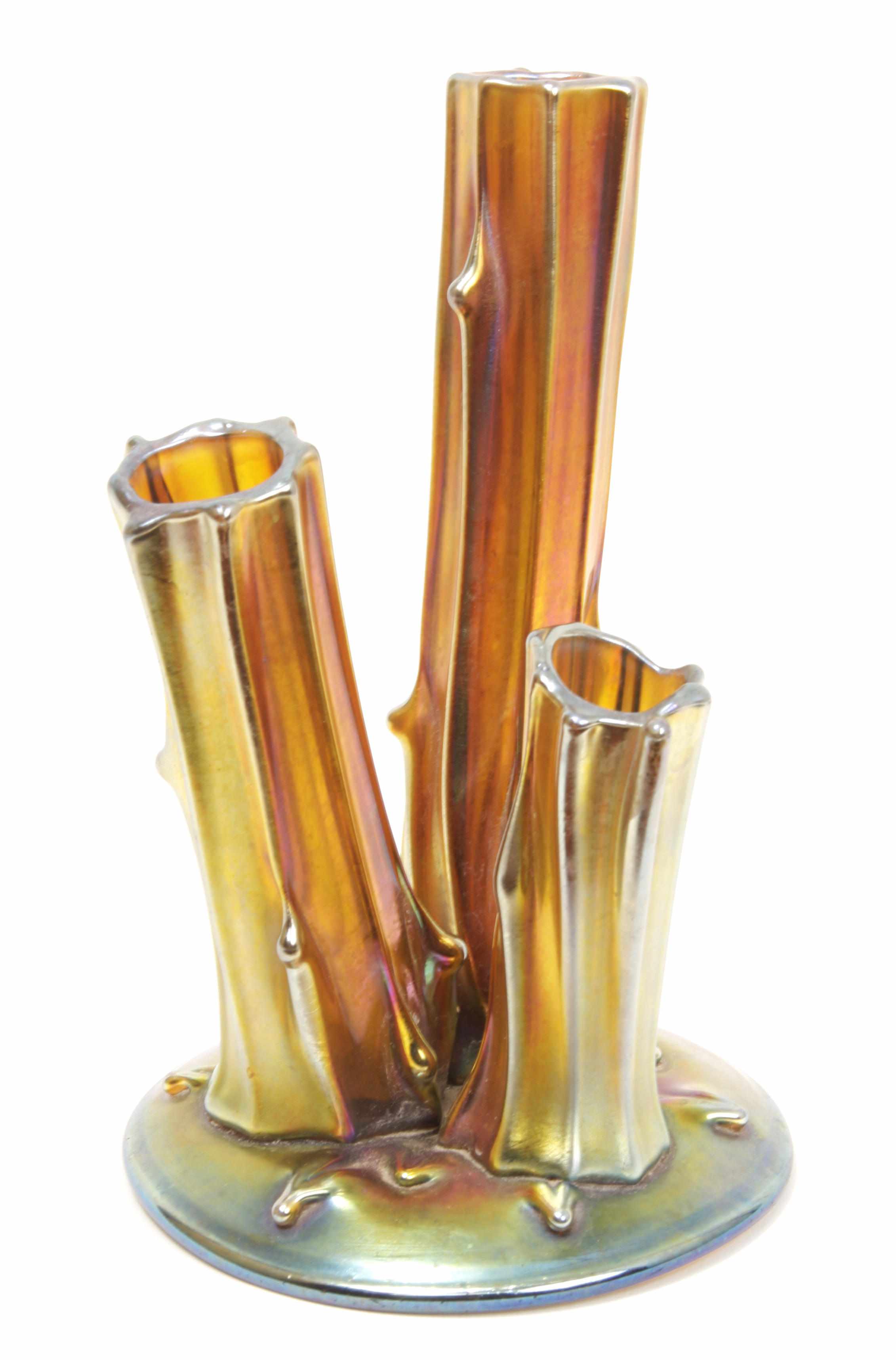 Appraisal: A Steuben Aurene glass three-pronged treetrunk vase inscribed height in