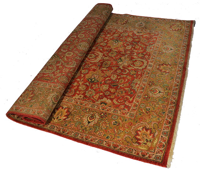 Appraisal: A LARGE RUST GROUND ZIEGLER RUG with dense foliate field