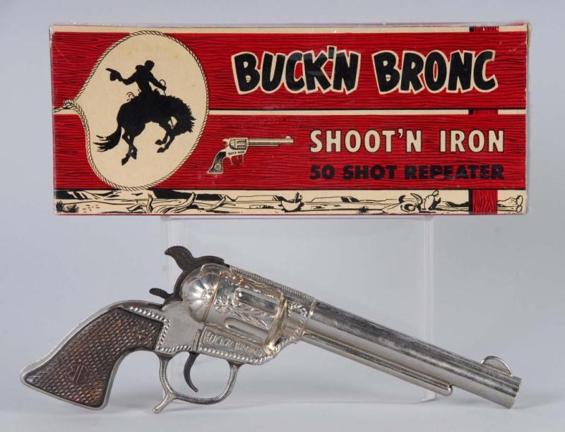 Appraisal: Buck-N-Bronc Cap Gun Description Manufactured by Schmidt Finish is very