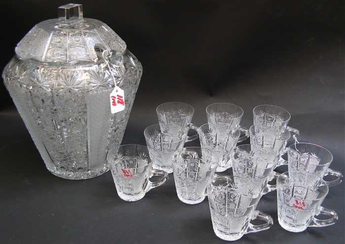 Appraisal: A FOURTEEN PIECE HAND CUT AND ENGRAVED GLASS COVERED PUNCH