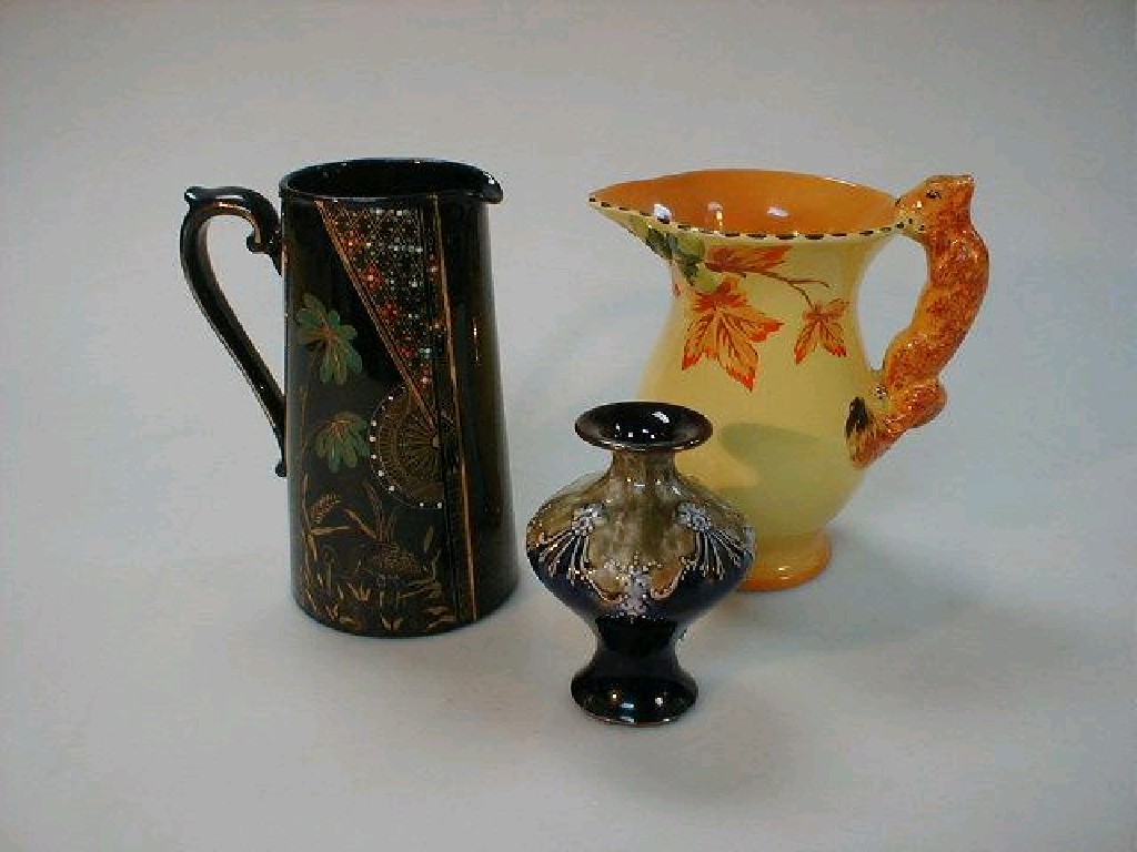 Appraisal: A Burleighware squirrel jug Jackfield type water jug and a