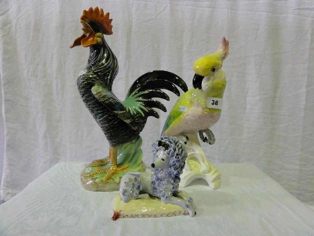 Appraisal: A Crown Staffordshire model of a cockatoo modelled by J