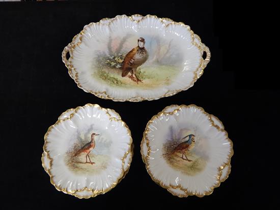 Appraisal: Limoges bird-themed porcelain plates and platter thirteen pieces polychrome central