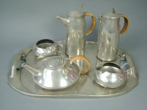 Appraisal: A matched Tudric tea and coffee set by Archibald Knox