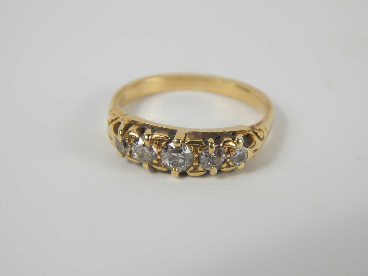 Appraisal: A diamond five stone ring claw set yellow metal approx