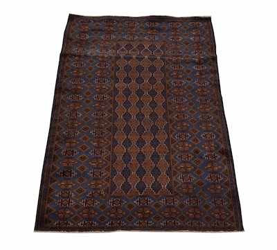 Appraisal: A Balouch Rug Dark tones contrasting warm brown with blues