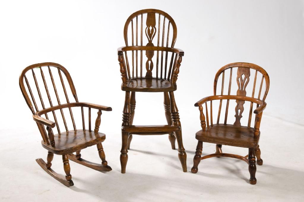 Appraisal: th CENTURY ELM CHILD'S WINDSOR HIGH CHAIR the hoop-back above