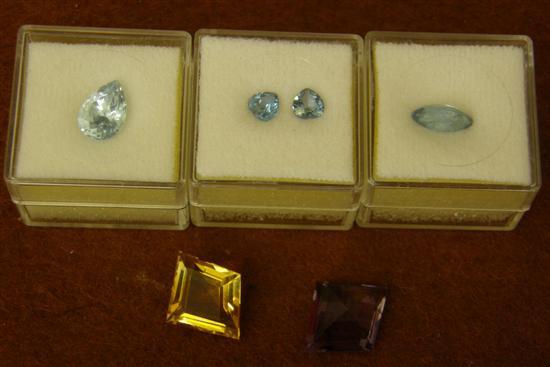 Appraisal: Three boxes containing four loose blue topaz stones two loose