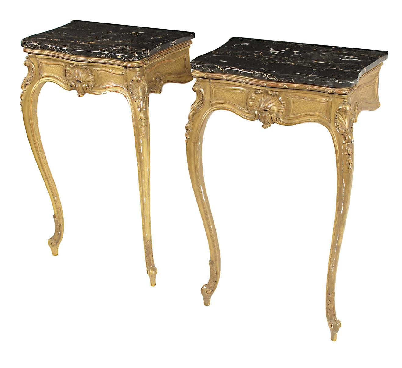 Appraisal: A pair of French giltwood and gesso serpentine console tables