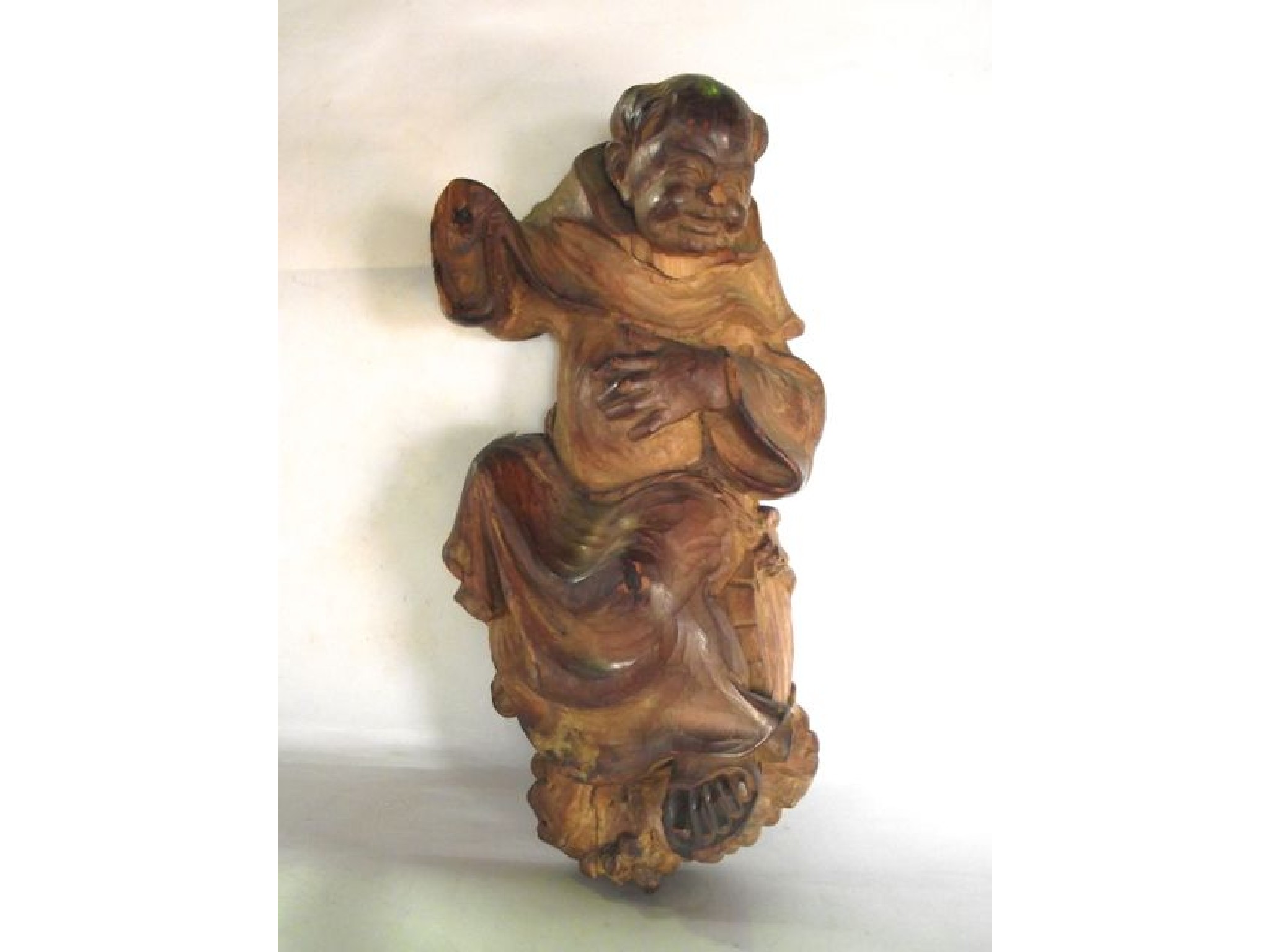 Appraisal: A good quality th century carved timber study of a