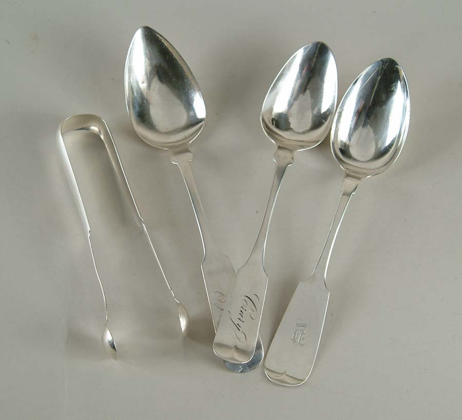 Appraisal: FOUR PIECES OF STERLING AND COIN FLATWARE Lot includes coin