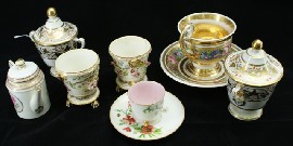 Appraisal: A Paris porcelain cup and saucer together with two gilt