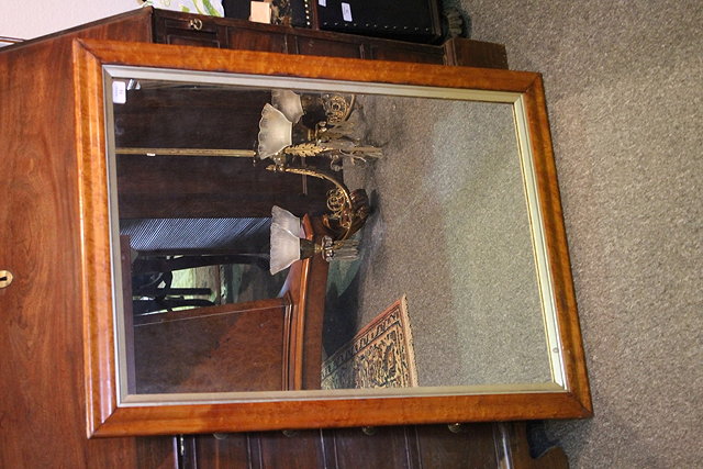 Appraisal: A VICTORIAN MAPLE FRAME RECTANGULAR WALL MIRROR with gilt slip