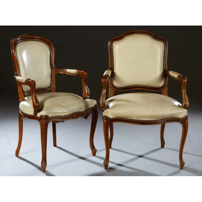 Appraisal: Near Pair of Louis XV Style Carved Beech Fauteuils early