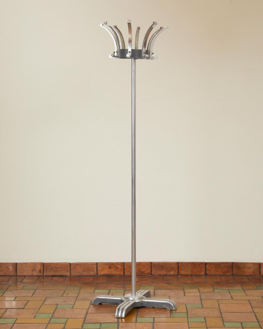 Appraisal: Machine Age chromed metal hat stand Circa s Unmarked Fluted