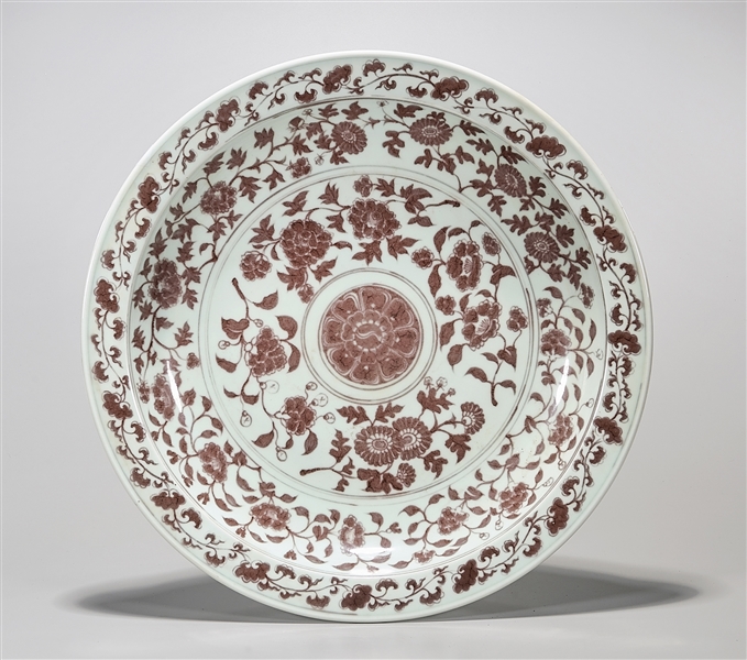 Appraisal: Chinese red and white porcelain charger with floral pattern decoration