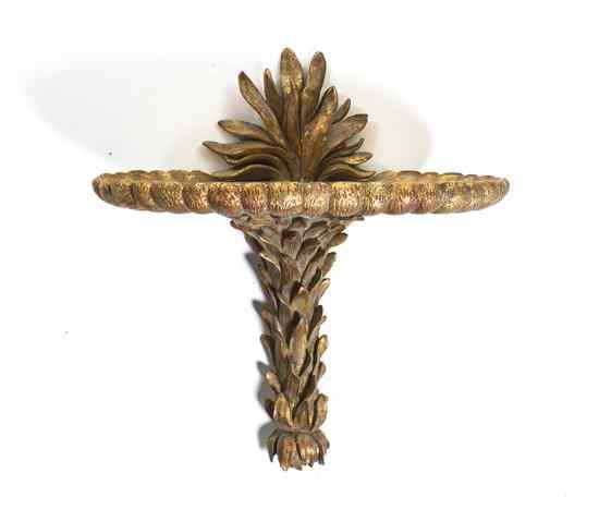 Appraisal: A Composite Gilt Decorated Bracket surmounted with a leaf form