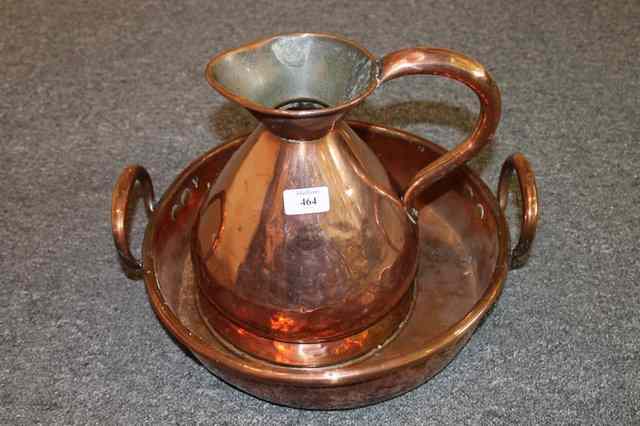 Appraisal: A VICTORIAN COPPER GALLON MEASURE and a two handled copper