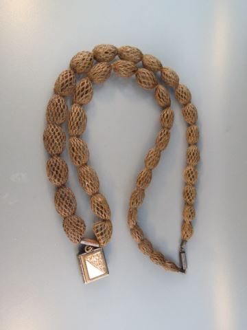 Appraisal: th Century Woven Hair Necklace oval beads with gold-filled locket