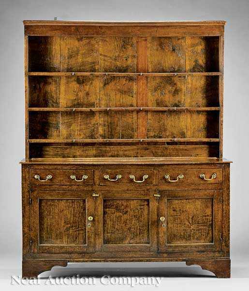 Appraisal: An Antique English Oak Welsh Dresser the upper section with