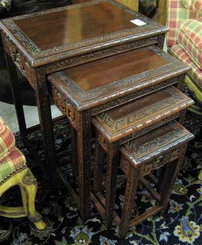 Appraisal: A NESTING SET OF CARVED TEAKWOOD QUARTETTO TABLES Chinese th