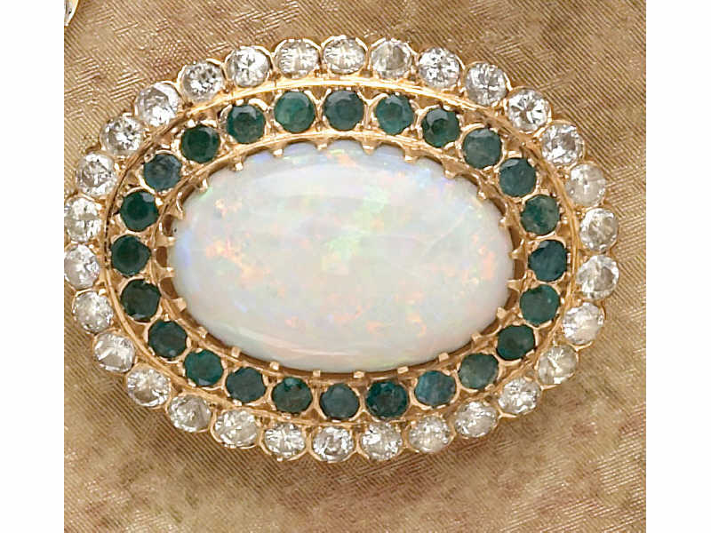 Appraisal: OPAL DIAMOND AND EMERALD BROOCH k yellow gold oval brooch