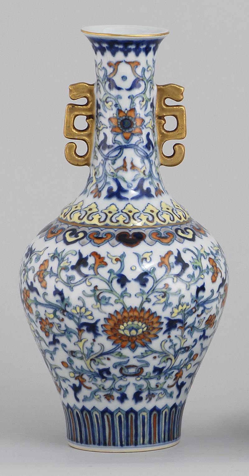 Appraisal: DOUCAI PORCELAIN VASE In mallet form with gilt dragon handles