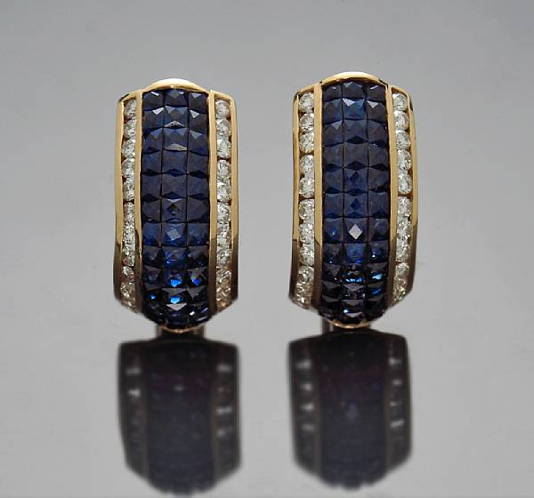 Appraisal: A pair of sapphire and diamond half hoop earrings estimated