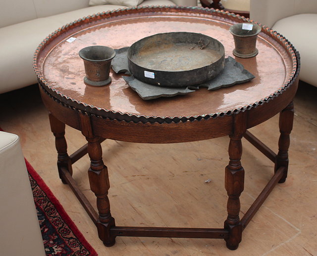 Appraisal: A LARGE COPPER TRAY TOPPED OCCASIONAL TABLE with circular top