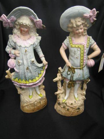 Appraisal: Pair of German Victorian Bisque Figurines boy girl