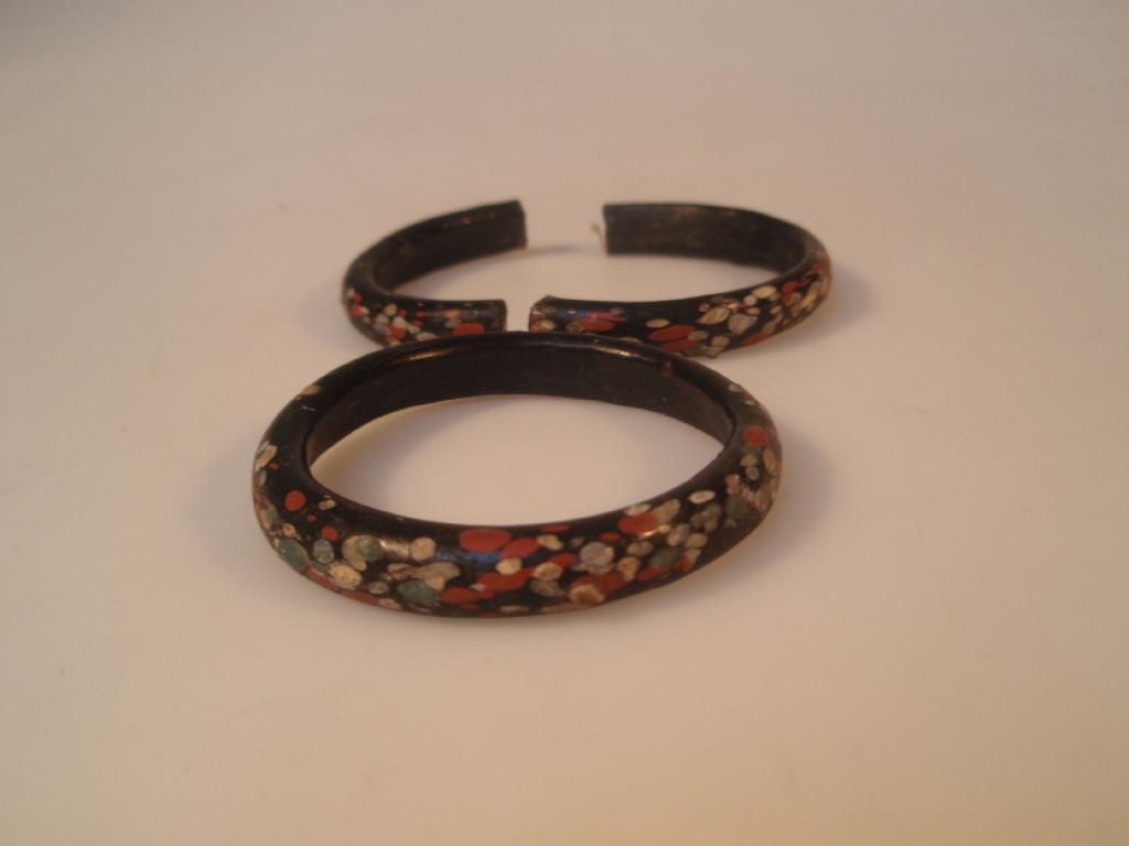 Appraisal: A Byzantine or Islamic glass bangle appearing black decorated with