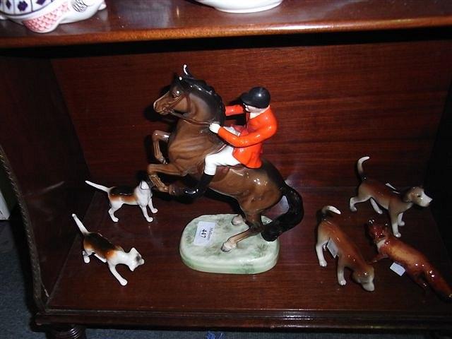 Appraisal: A BESWICK HUNTSMAN ON A REARING HORSE no high faults