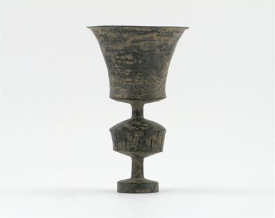 Appraisal: A South East Asian black lacquer libation cup with an