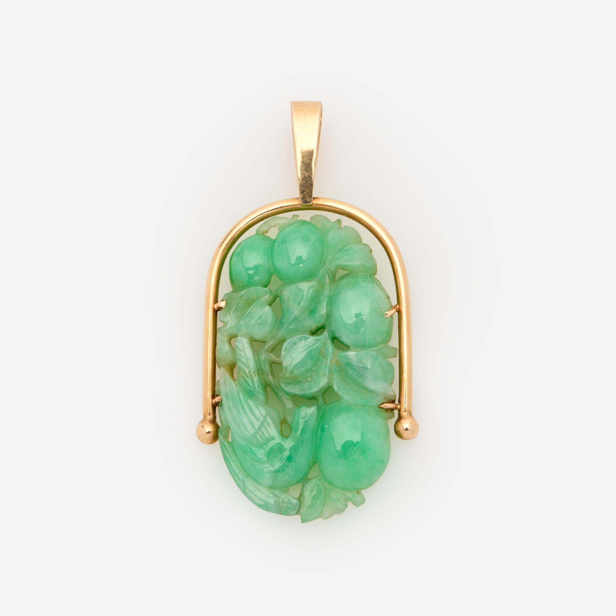 Appraisal: CARVED JADEITE JADE BIRD FRUIT PENDANT IN K T M