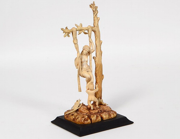 Appraisal: CONTINENTAL CARVED IVORY GROUP OF VENUS AND CUPIDProbably German Circa