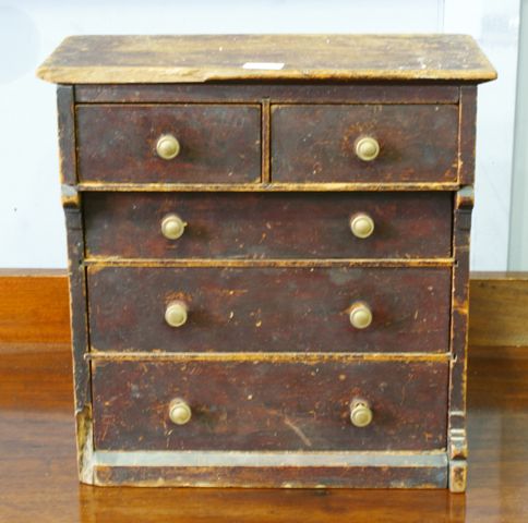 Appraisal: An Australian cedar miniature piece chest of drawers with five