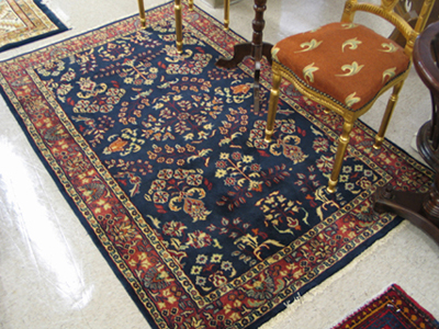 Appraisal: HAND KNOTTED ORIENTAL AREA RUG Persian Sarouk design overall floral