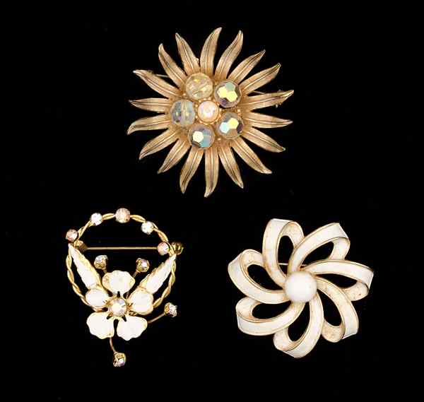 Appraisal: Trifari Unsigned Costume Jewelry Collection Two unsigned rhinestone brooches and