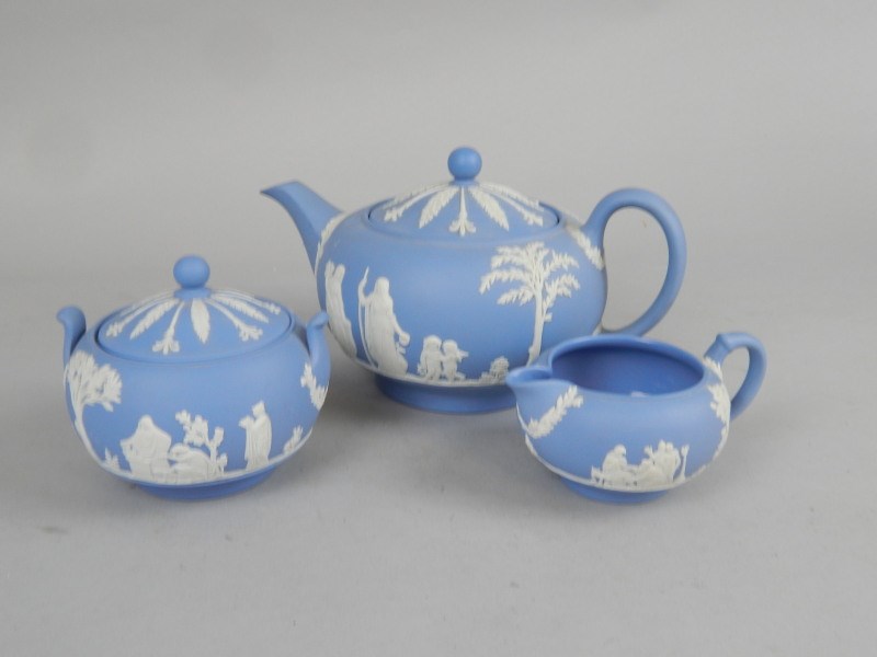 Appraisal: A Wedgwood blue Jasperware three piece tea set